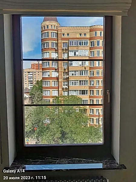 Пластиковое окно с ламинацией.